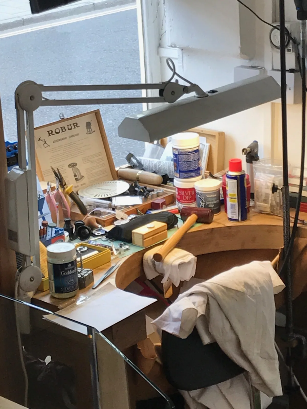The goldsmith's bench with a lamp and tools